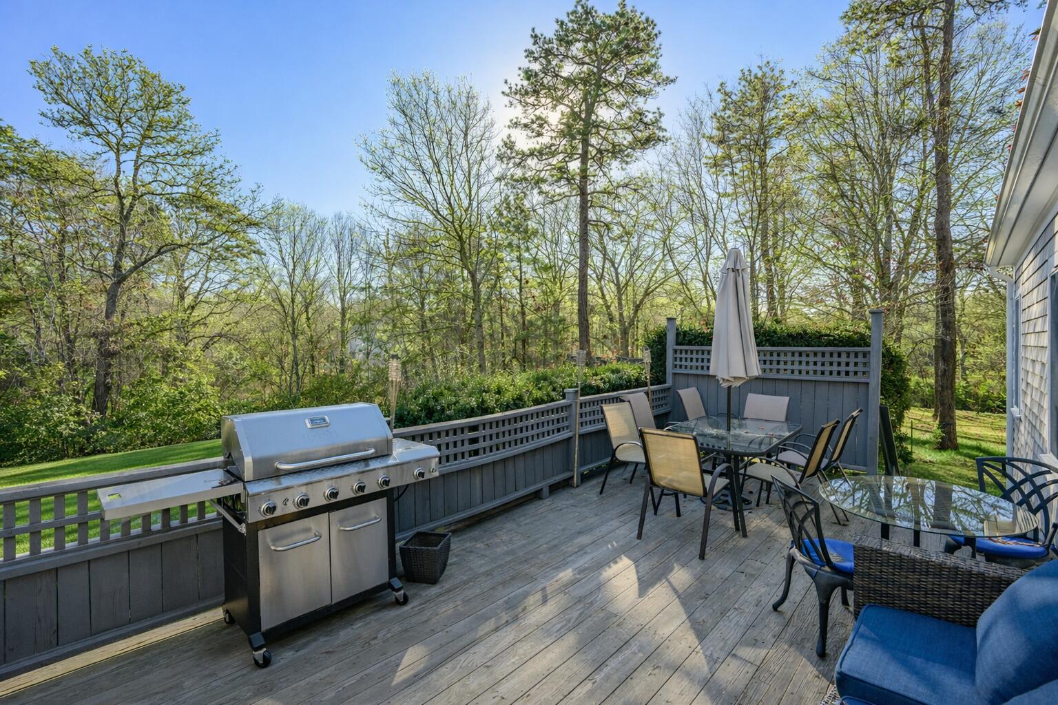 578 Huckins Neck Road Centerville, MA 02632 - Photo 37 of 51 Sunny deck amidst pine trees