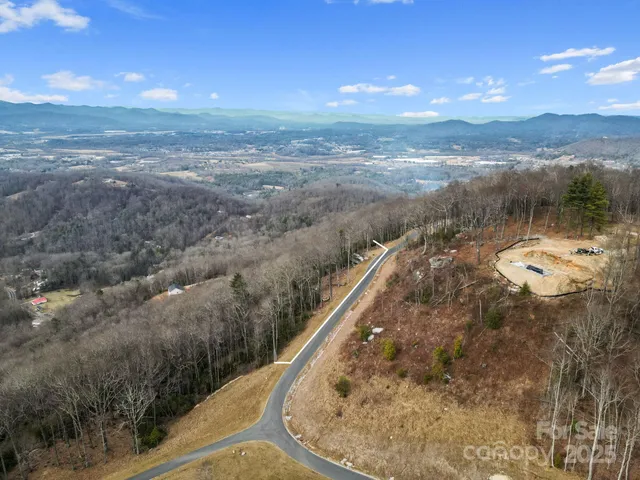 a view of a yard from a balcony