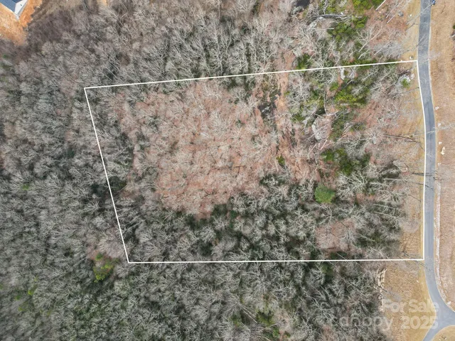 a view of a yard with an outdoor space