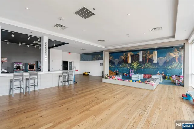 a view of a living room and dining room