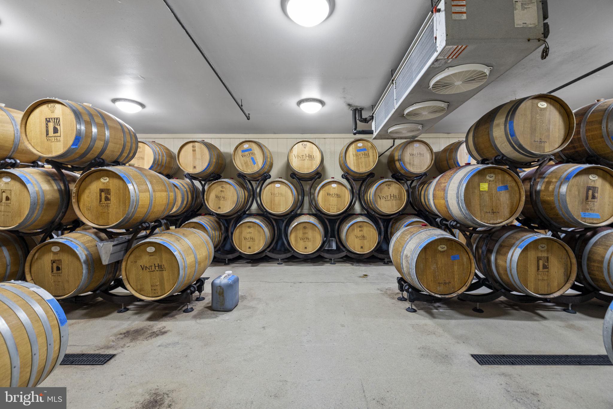 6190 Georgetown Road Broad Run, VA 20137 - Photo 76 of 95 The barrel room at Vint Hill Craft Winery