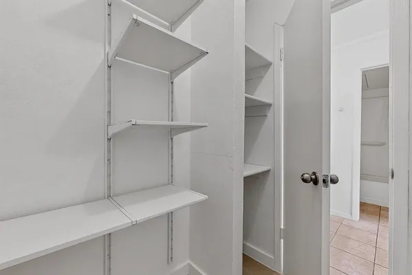 a view of an empty walk in closet