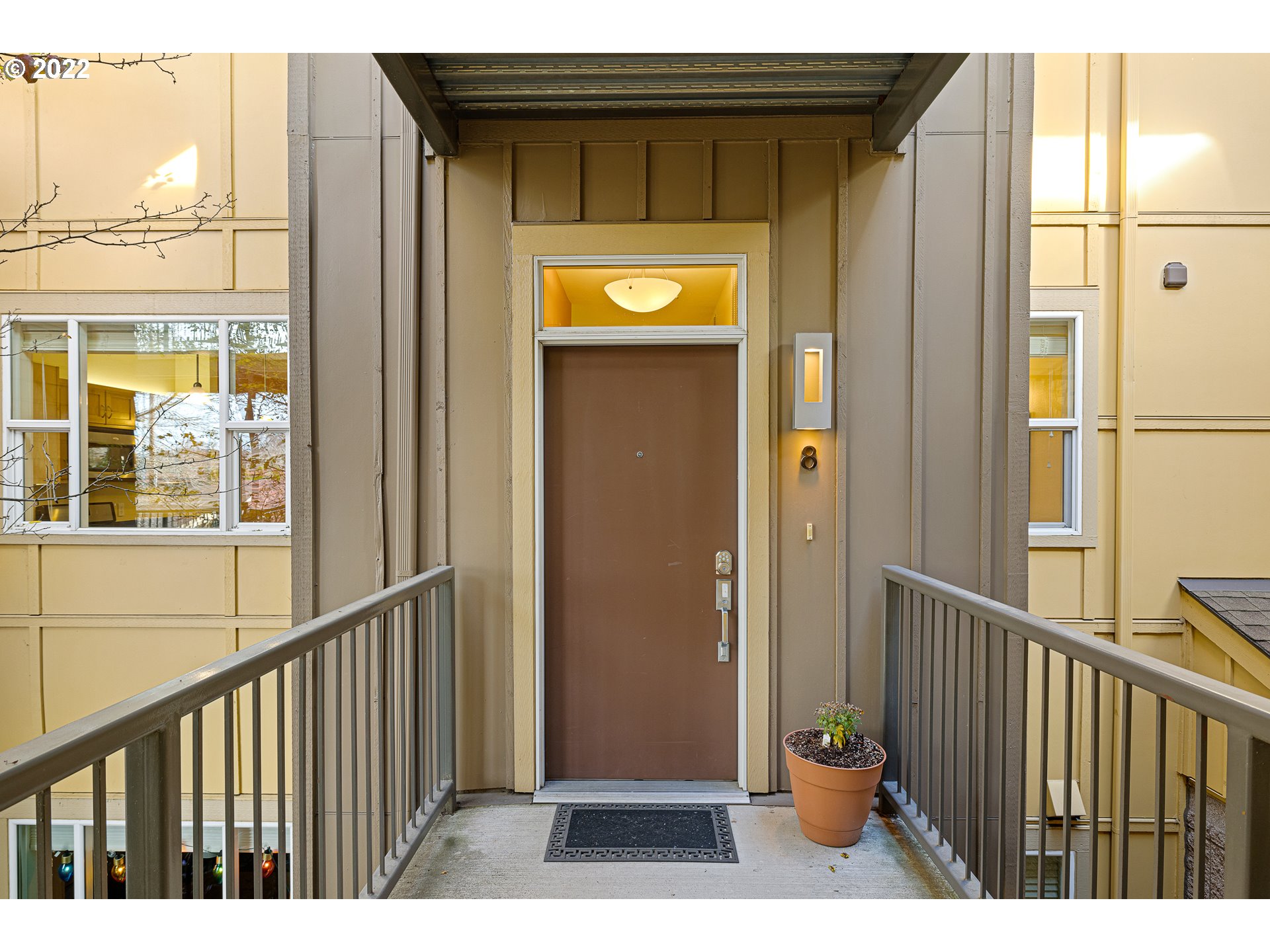 a view of a door and a window