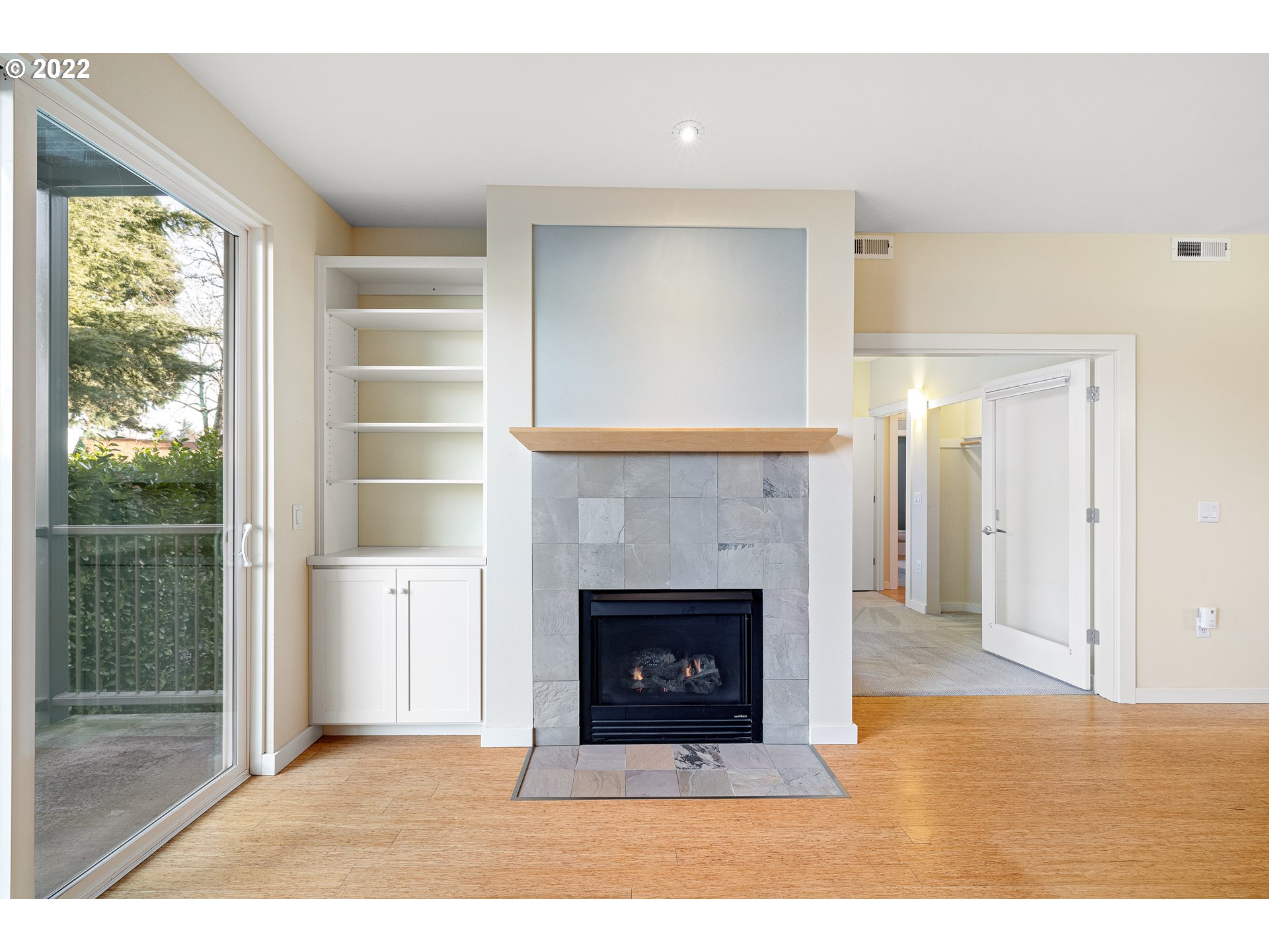 347 Rustic Place, Unit 8 Eugene, OR 97401 - Photo 11 of 31 a view of a livingroom with a fireplace and window