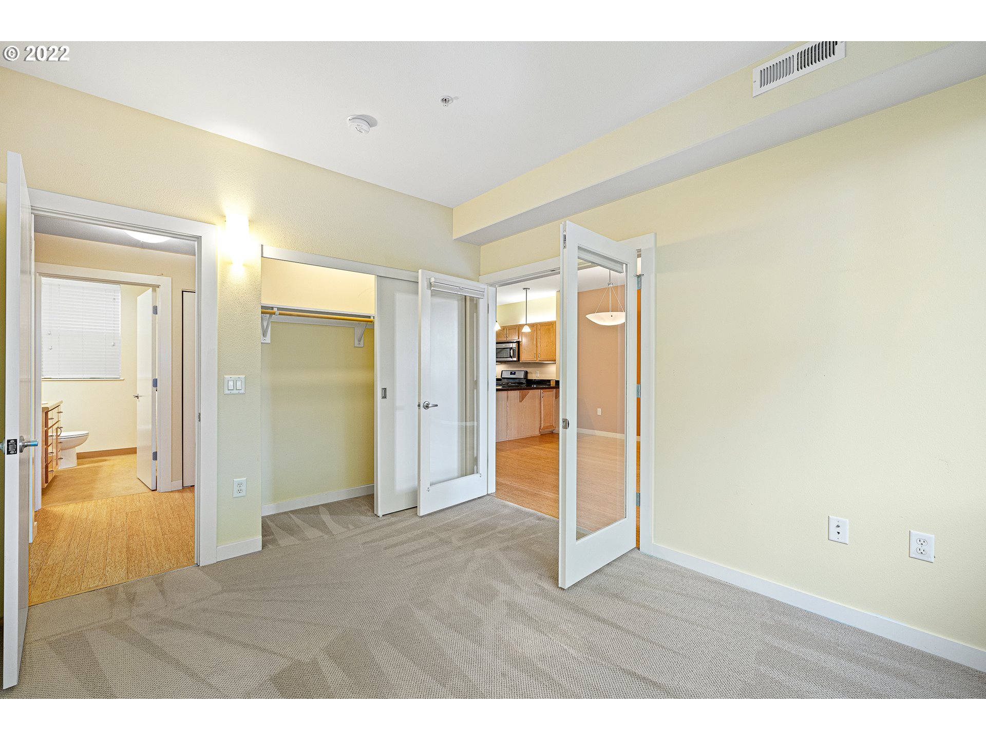 347 Rustic Place, Unit 8 Eugene, OR 97401 - Photo 17 of 31 a view of empty room with wooden floor