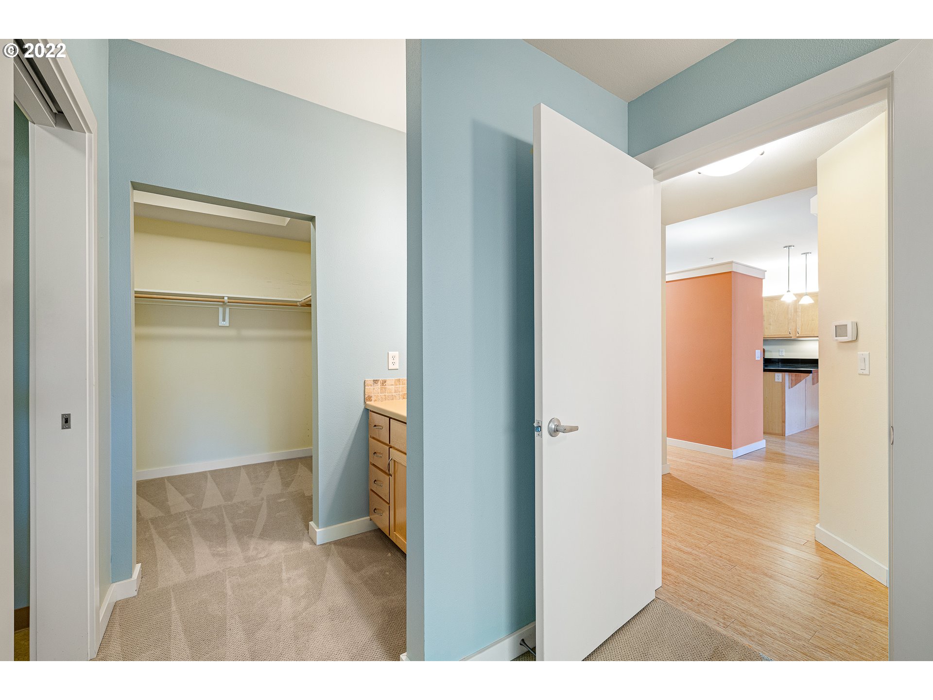 347 Rustic Place, Unit 8 Eugene, OR 97401 - Photo 26 of 31 a view of an empty room with wooden floor