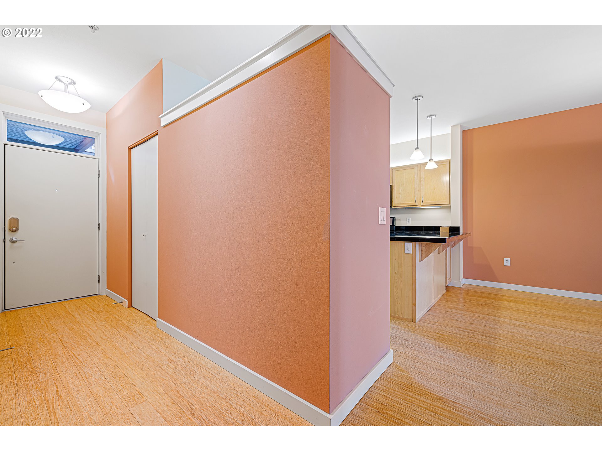 347 Rustic Place, Unit 8 Eugene, OR 97401 - Photo 3 of 31 a view of empty room with wooden floor