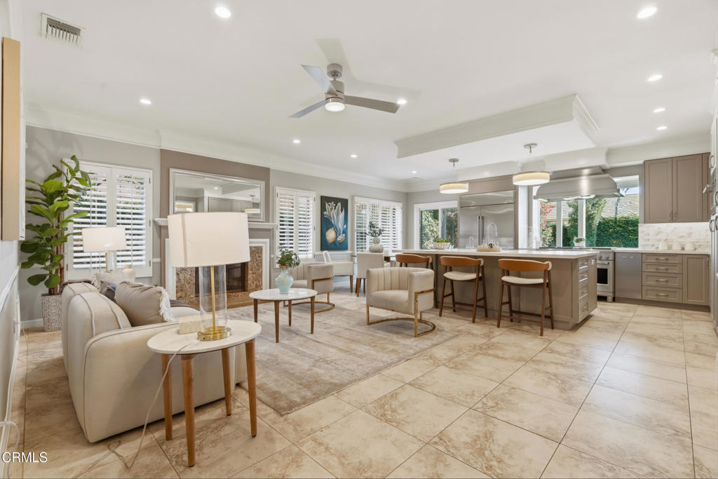 11543 Ragusa Drive Rancho Cucamonga, CA 91701 - Photo 17 of 69 a living room with lots of furniture and kitchen view