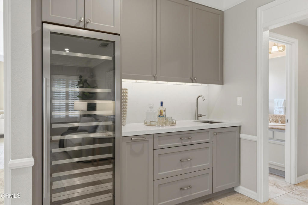 11543 Ragusa Drive Rancho Cucamonga, CA 91701 - Photo 28 of 69 a bathroom with a sink a vanity and a mirror