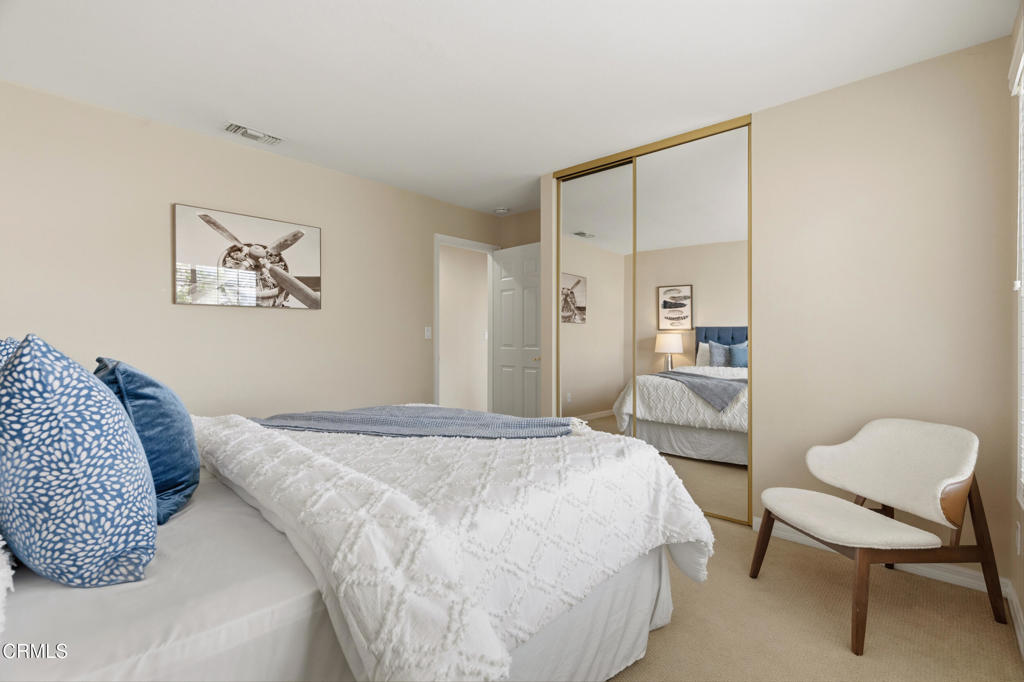 11543 Ragusa Drive Rancho Cucamonga, CA 91701 - Photo 36 of 69 a bedroom with a bed and chair