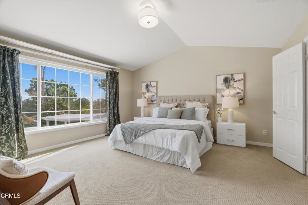 11543 Ragusa Drive Rancho Cucamonga, CA 91701 - Photo 40 of 69 a spacious bedroom with a bed and a large window