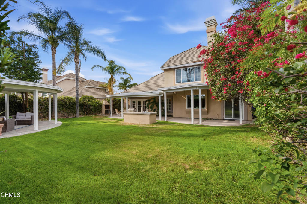 11543 Ragusa Drive Rancho Cucamonga, CA 91701 - Photo 55 of 69 a front view of a house with a garden
