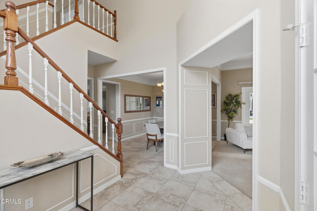 11543 Ragusa Drive Rancho Cucamonga, CA 91701 - Photo 6 of 69 a view of an entryway and livingroom with furniture