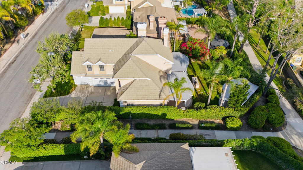 11543 Ragusa Drive Rancho Cucamonga, CA 91701 - Photo 62 of 69 an aerial view of a house with a yard and potted plants