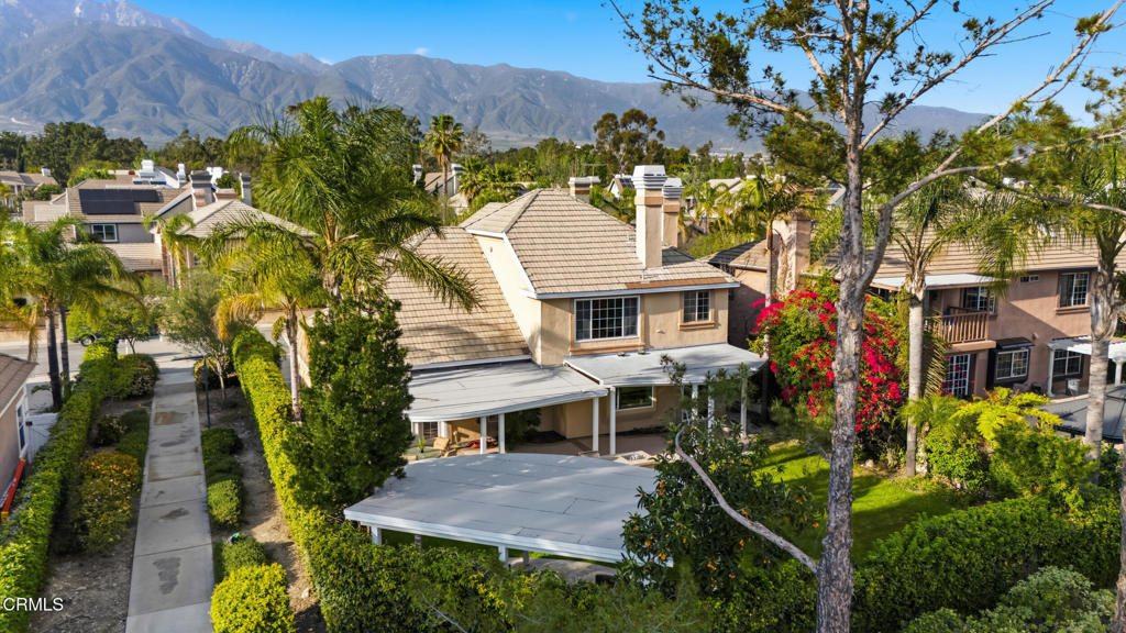 11543 Ragusa Drive Rancho Cucamonga, CA 91701 - Photo 63 of 69 a view of house with a yard and furniture