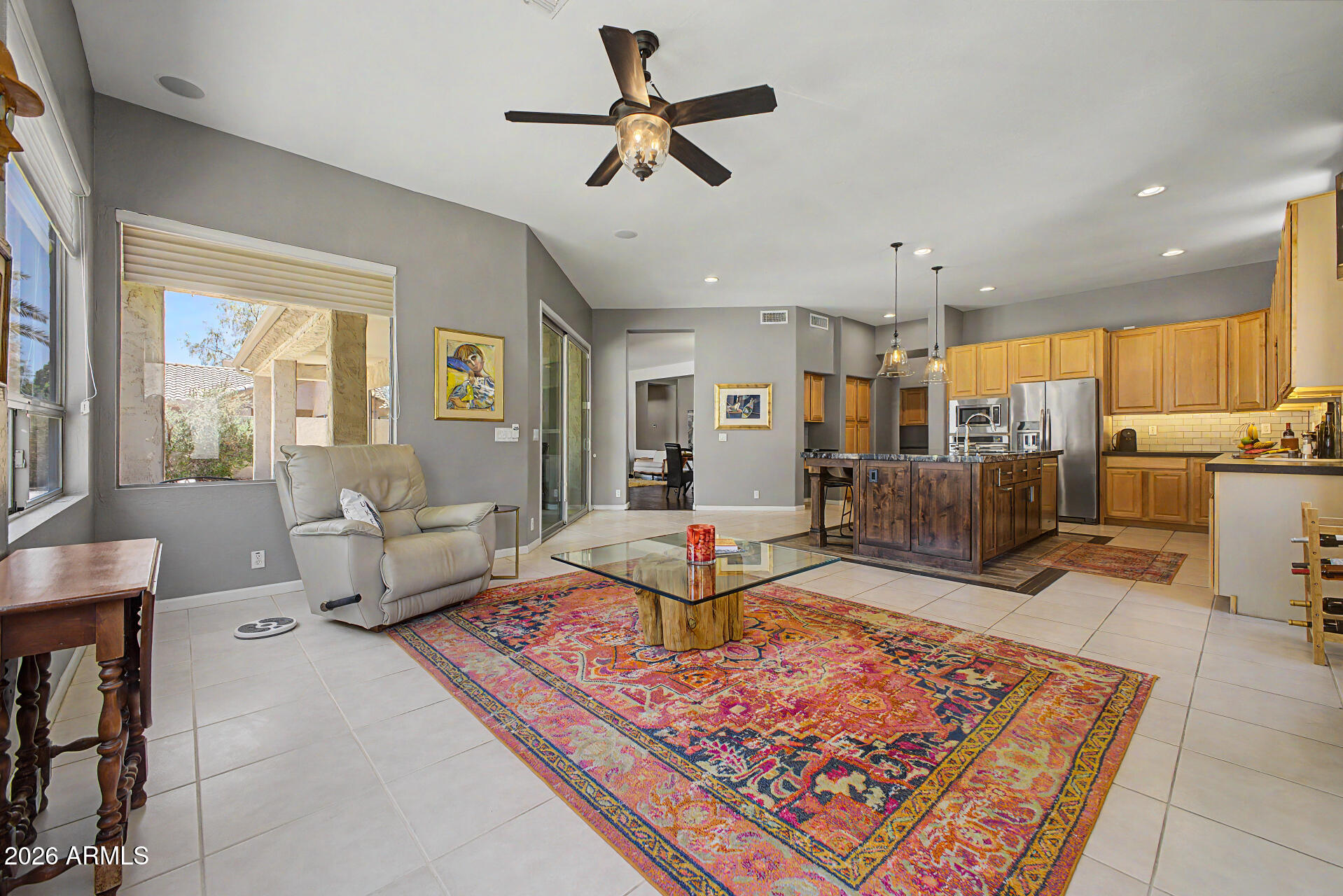 1632 West Frye Road Phoenix, AZ 85045 - Photo 5 of 37 a living room with lots of furniture and kitchen view