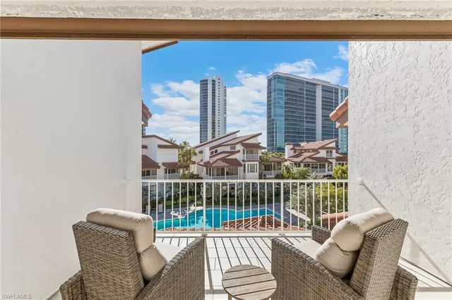 a balcony with wooden floor