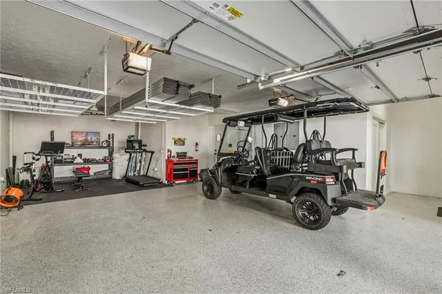 a view of a garage with cars