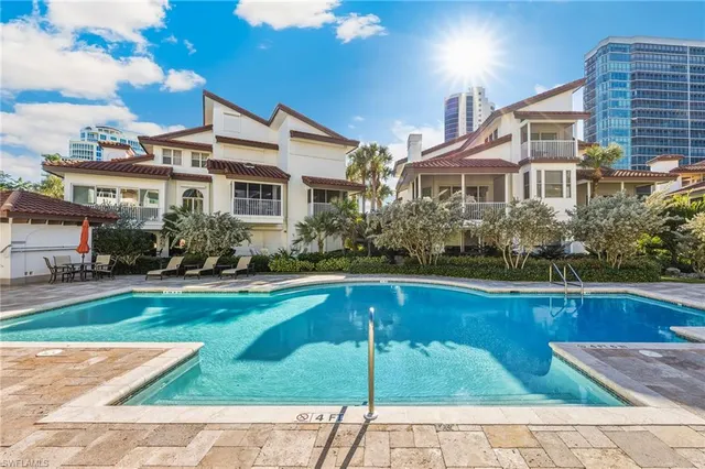 a front view of a house with swimming pool