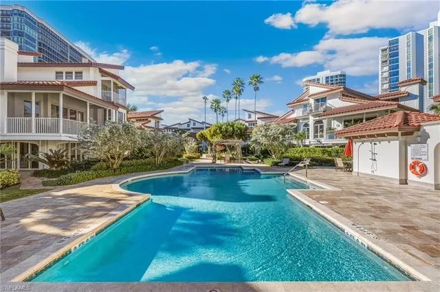 a view of a house with swimming pool