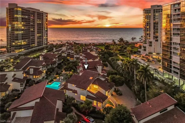 a view of city with ocean