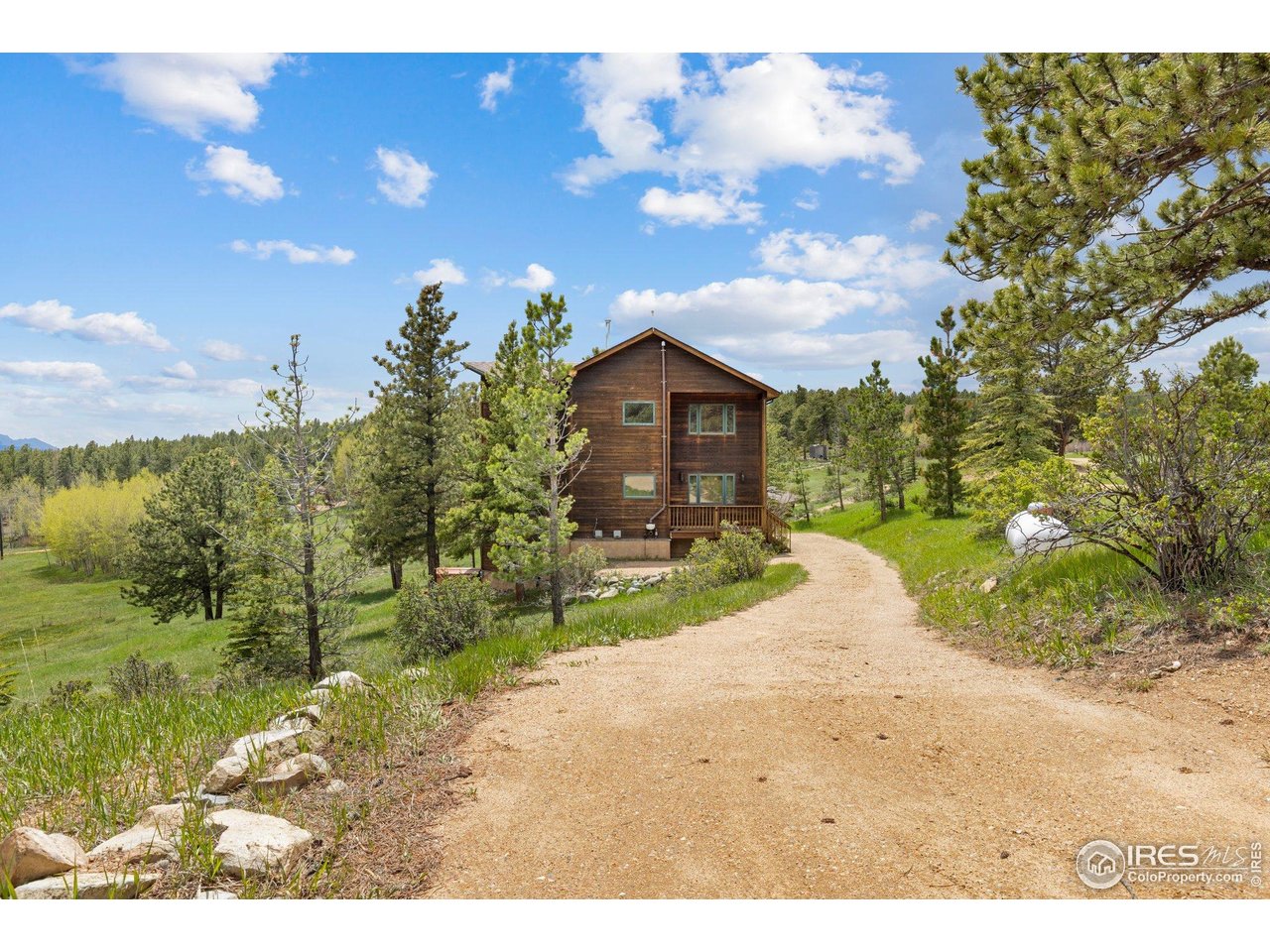 1117 Rock Lake Road Ward, CO 80481 - Photo 6 of 40 North elevation from the northern driveway.