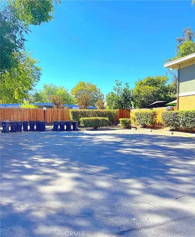 a view of a swimming pool with a yard