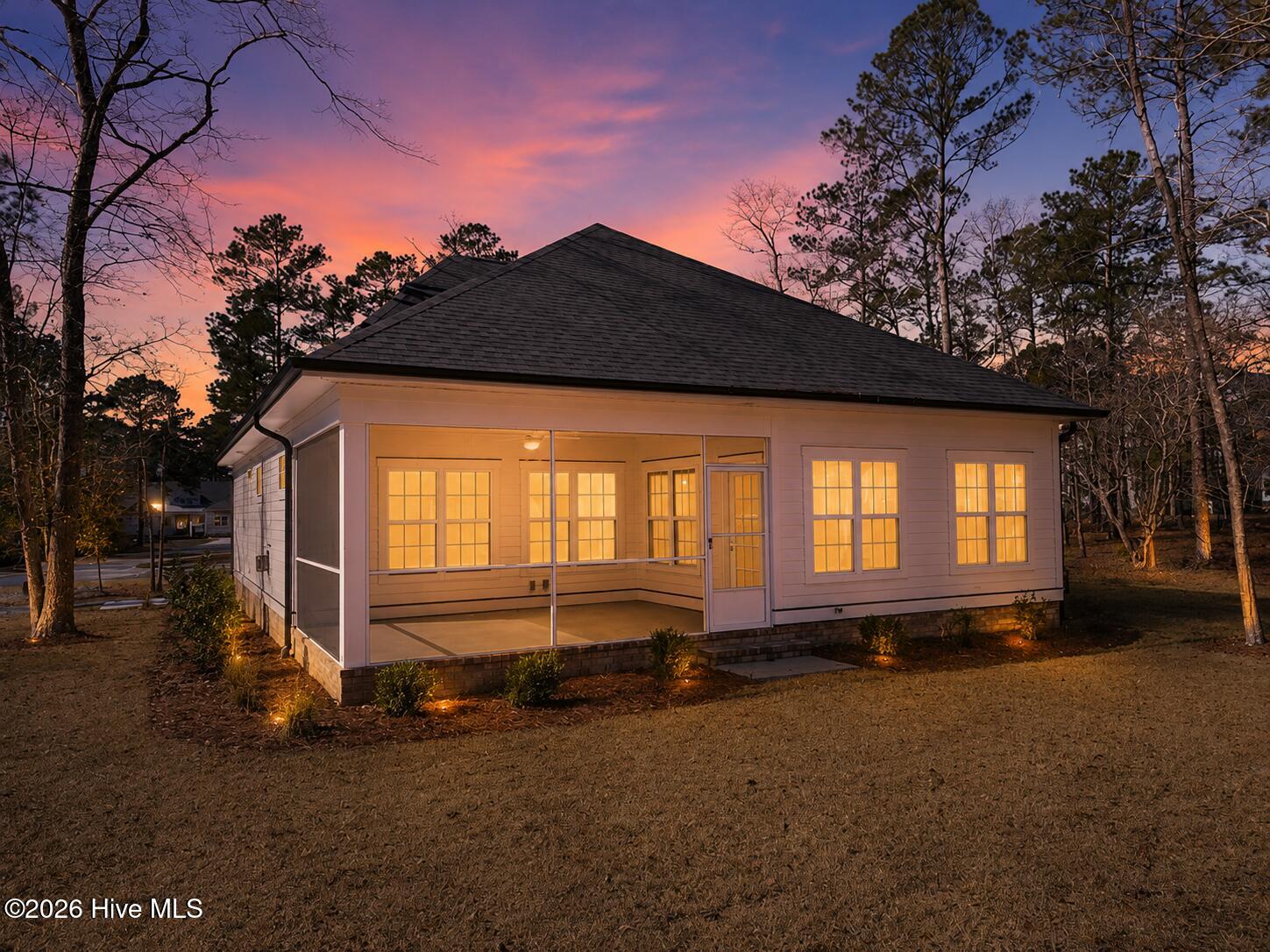992 Ashburton Road Southeast Bolivia, NC 28422 - Photo 5 of 78 Rear view at sunset