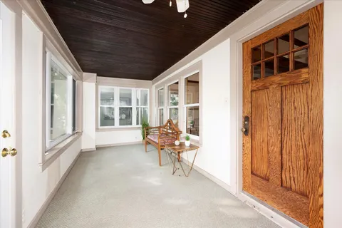 a balcony with furniture and garden