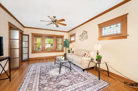 a living room with furniture and a rug