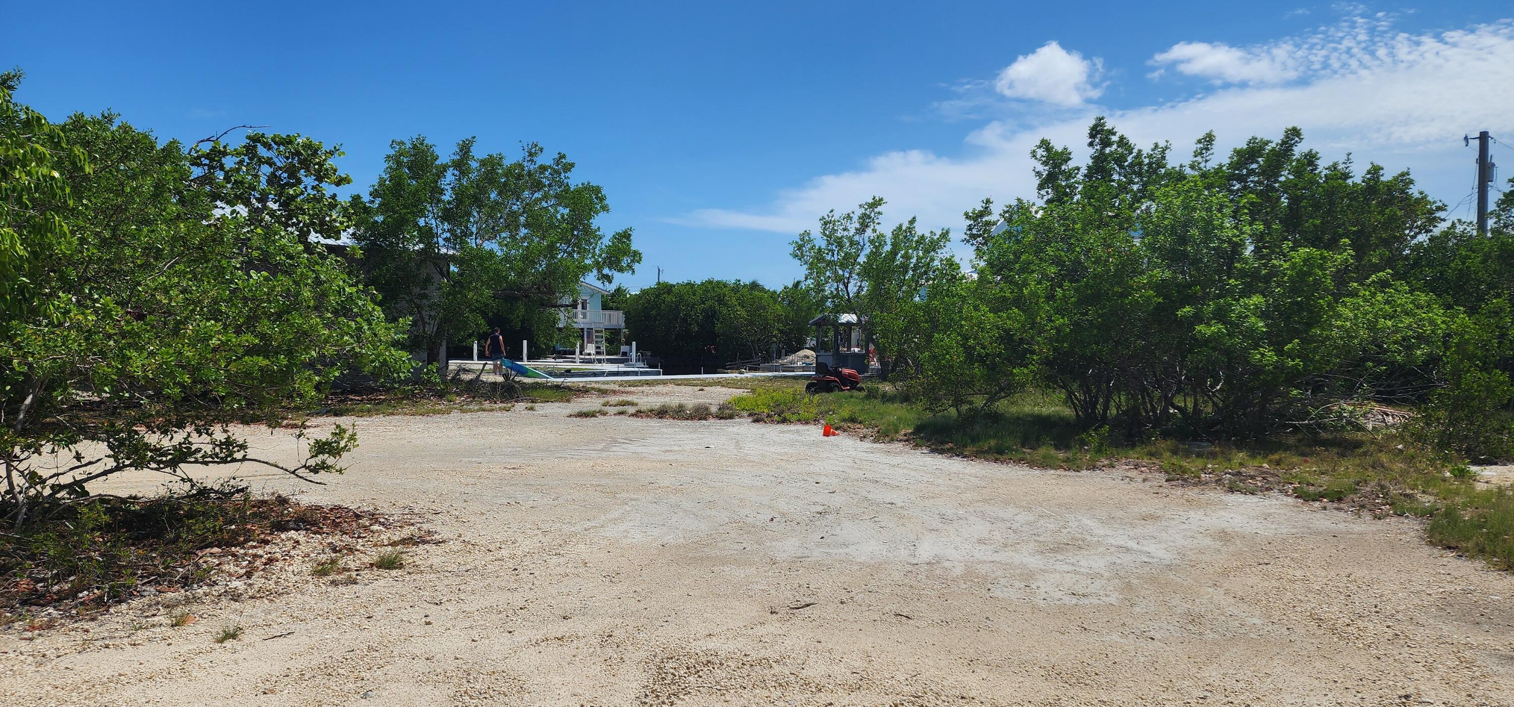 5 Coral Way Big Pine Key, FL 33043 - Photo 5 of 19 a view of outdoor space with trees all around