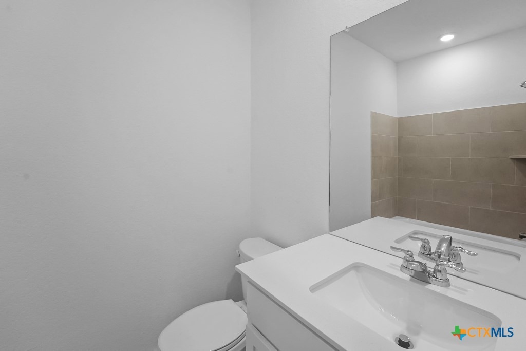 247 Flathead New Braunfels, TX 78130 - Photo 11 of 17 Bathroom with vanity and toilet