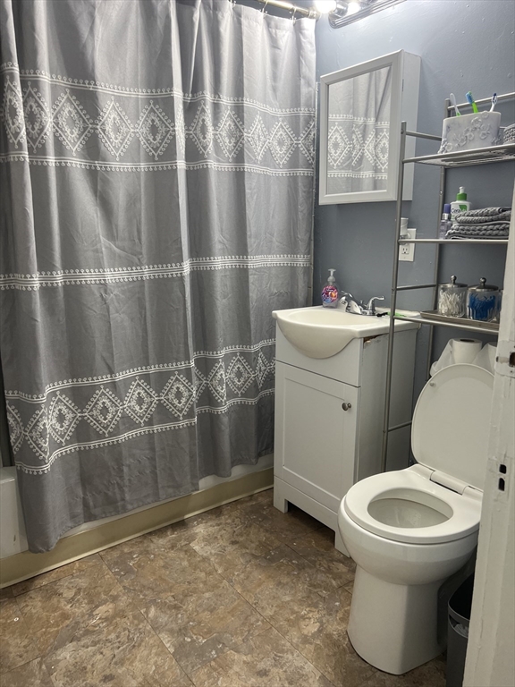 123-125 Ranney Street Springfield, MA 01108 - Photo 24 of 26 a bathroom with a sink toilet and shower