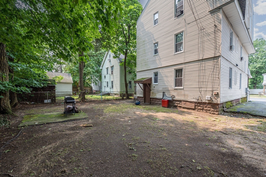 123-125 Ranney Street Springfield, MA 01108 - Photo 26 of 26 a view of a house with backyard and sitting area