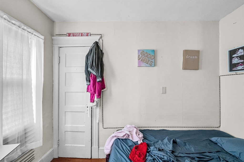 123-125 Ranney Street Springfield, MA 01108 - Photo 6 of 26 a room with toys and closet