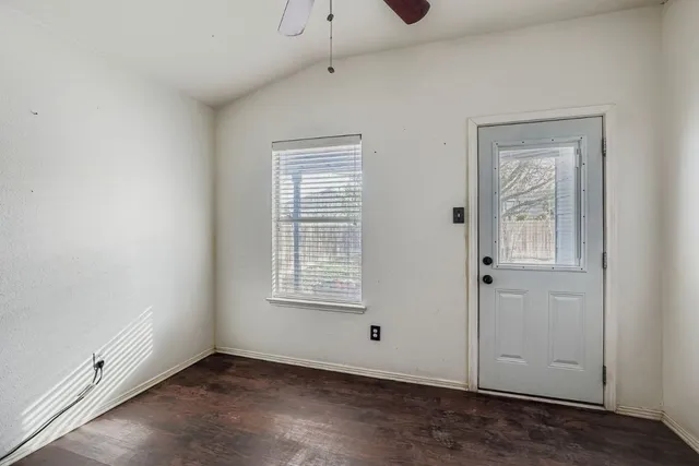 an empty room with windows