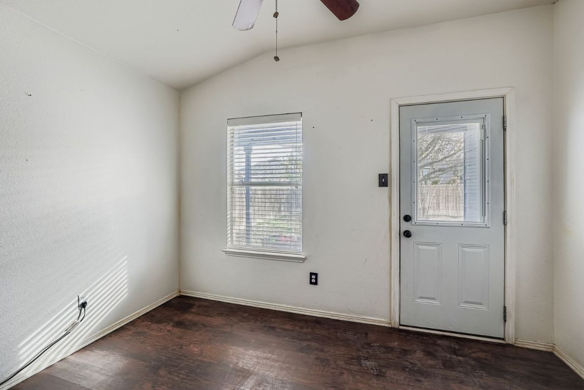 200 Firebush Way Buda, TX 78610 - Photo 16 of 29 an empty room with windows