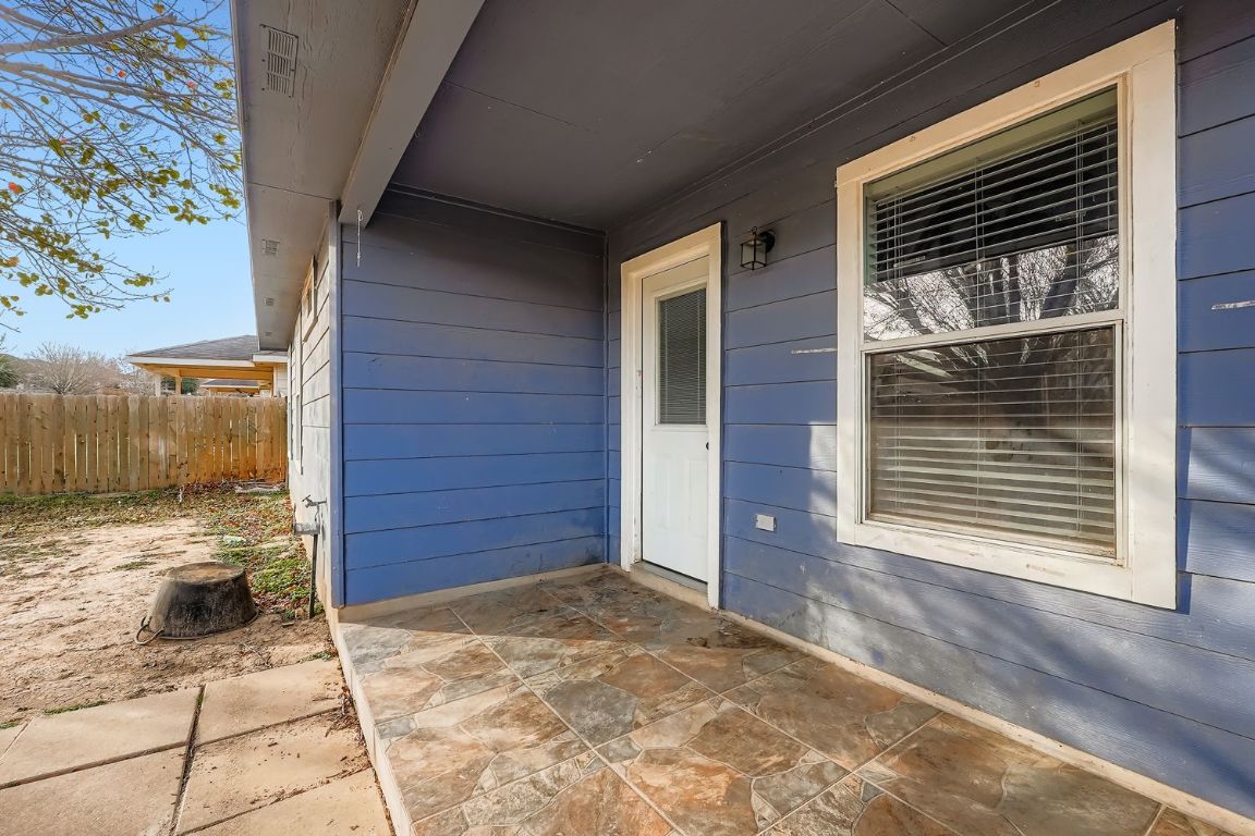 200 Firebush Way Buda, TX 78610 - Photo 26 of 29 a view of front door of house