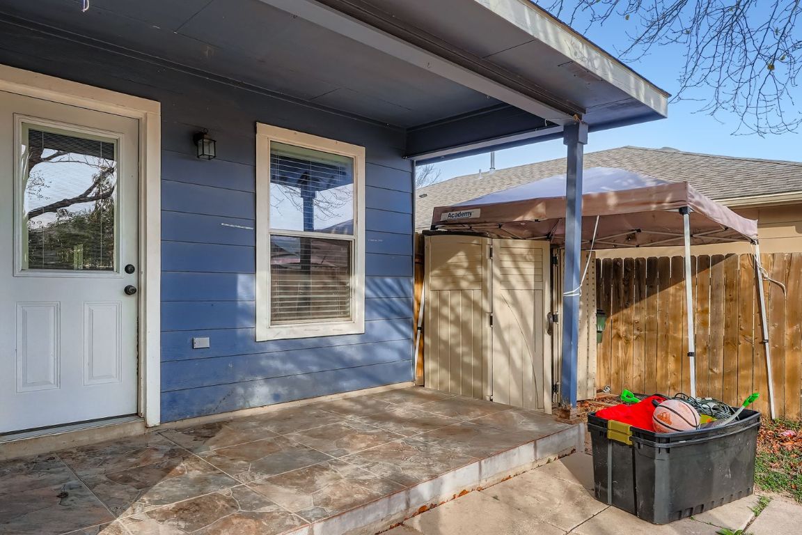 200 Firebush Way Buda, TX 78610 - Photo 27 of 29 a view of a entryway door of the house