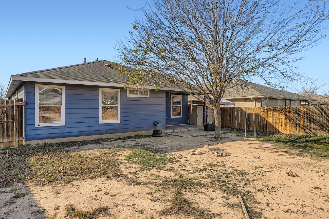 200 Firebush Way Buda, TX 78610 - Photo 28 of 29 a view of a house with a yard