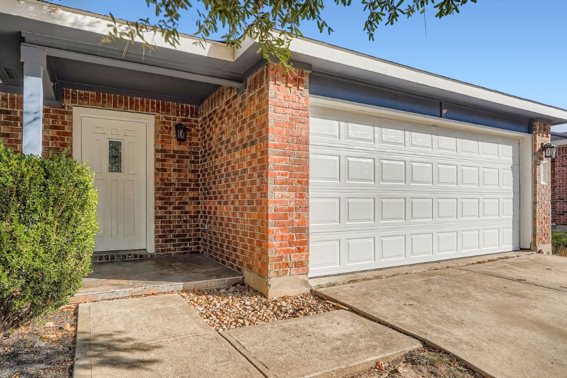 200 Firebush Way Buda, TX 78610 - Photo 3 of 29 a view of an entrance to house