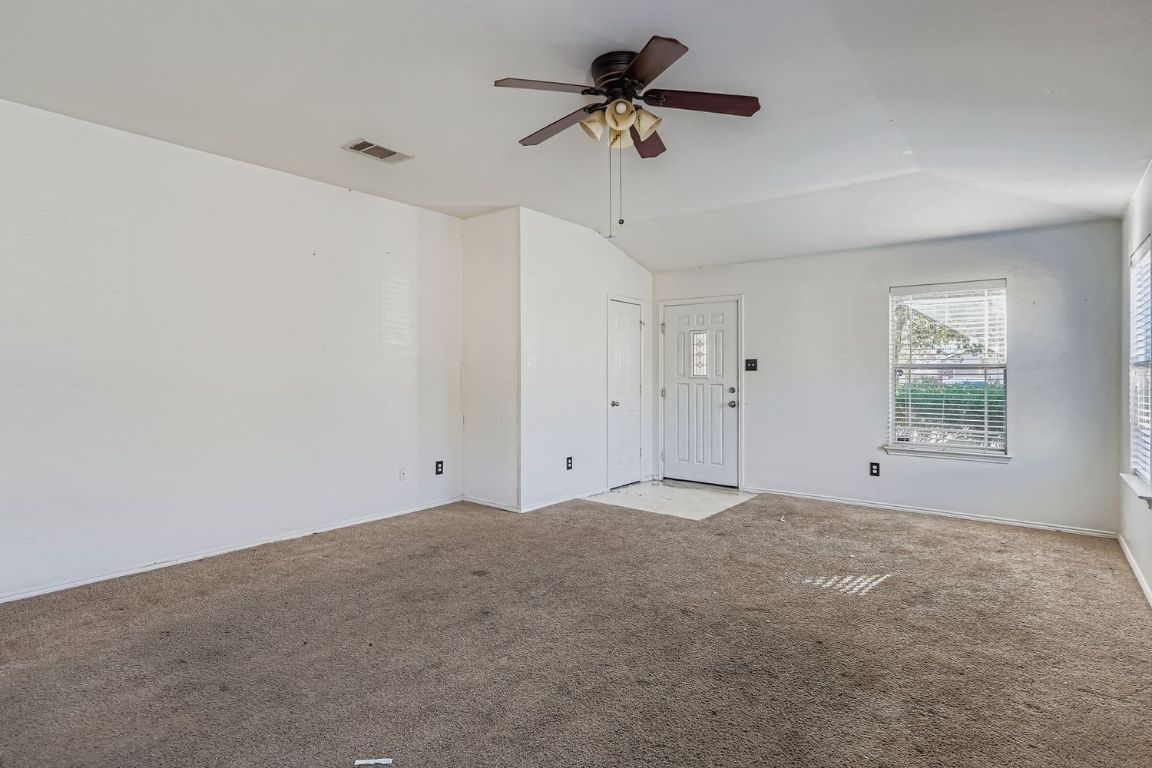 200 Firebush Way Buda, TX 78610 - Photo 5 of 29 a view of an empty room with a window