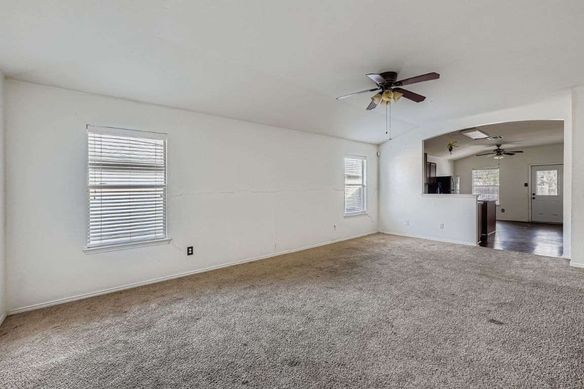 200 Firebush Way Buda, TX 78610 - Photo 9 of 29 a view of an empty room with a window