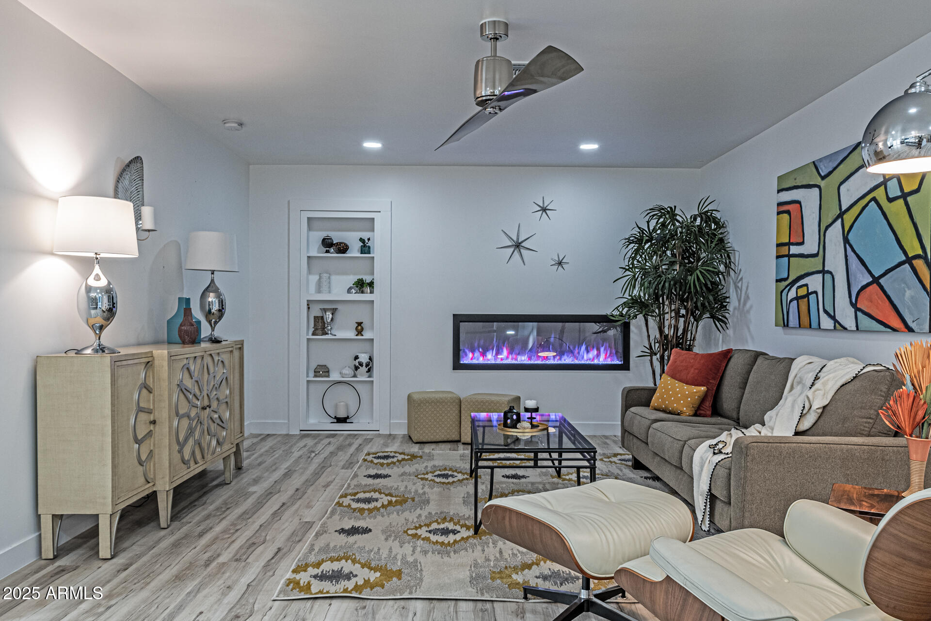 1539 West Puget Avenue Phoenix, AZ 85021 - Photo 15 of 29 a living room with furniture and painting on the wall