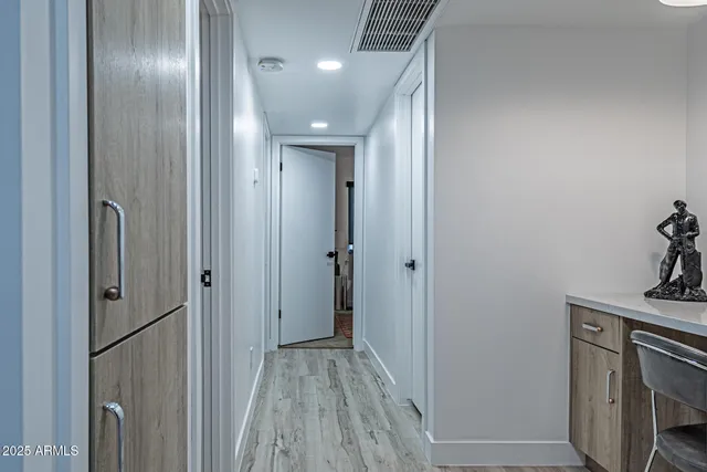 a bedroom with a bed and a tv