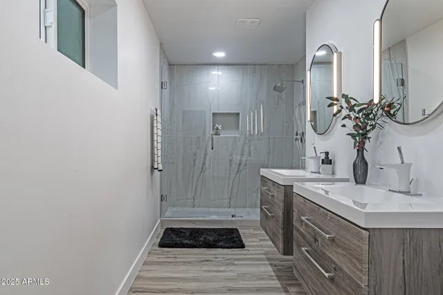a view of kitchen island sink and refrigerator