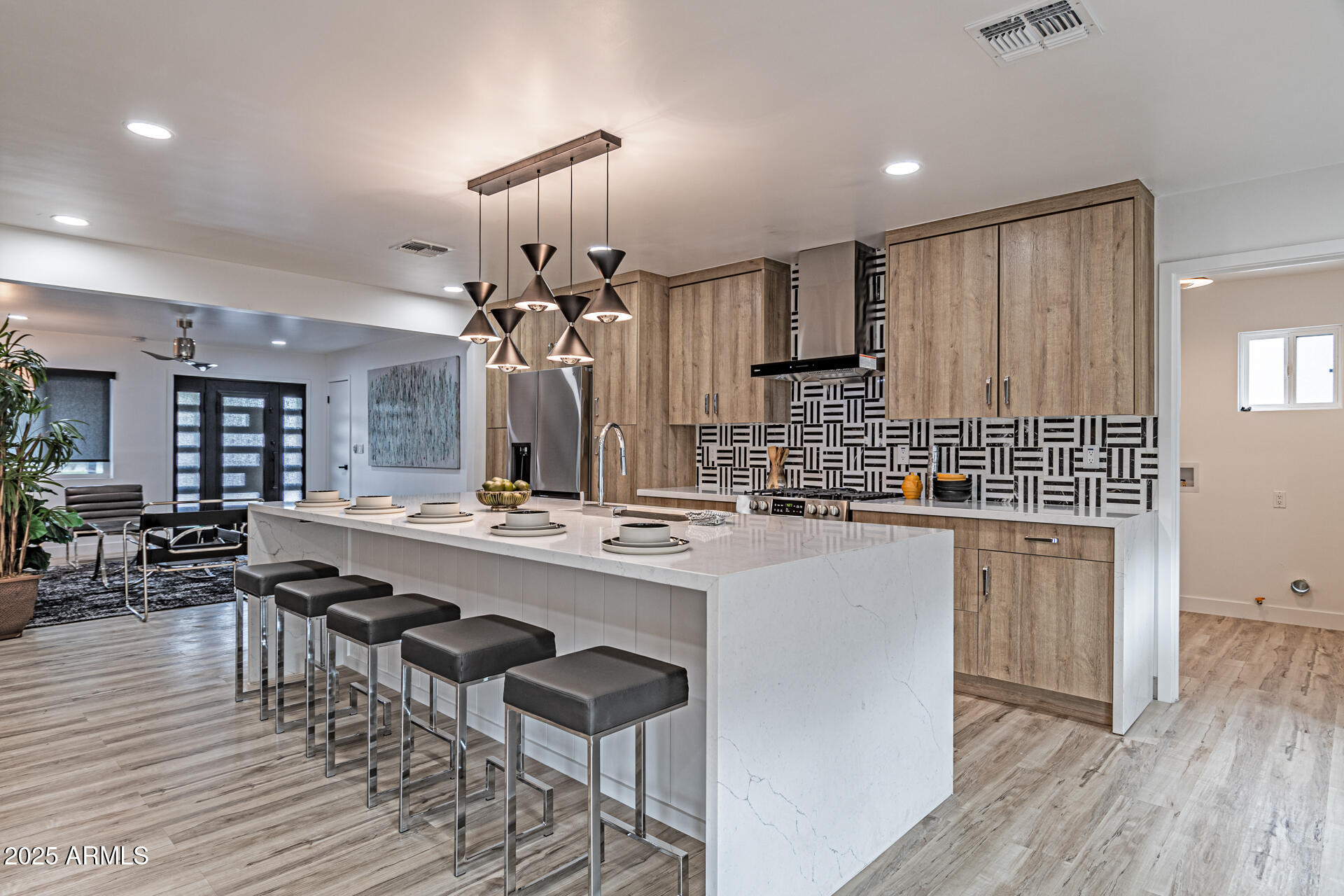 1539 West Puget Avenue Phoenix, AZ 85021 - Photo 7 of 29 a large kitchen with a table and chairs
