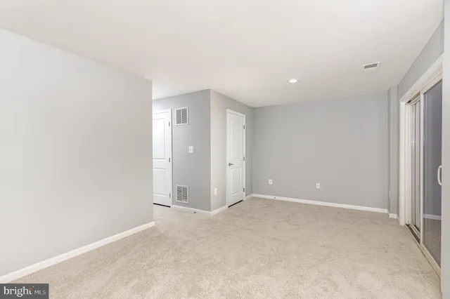 an empty room with an entryway