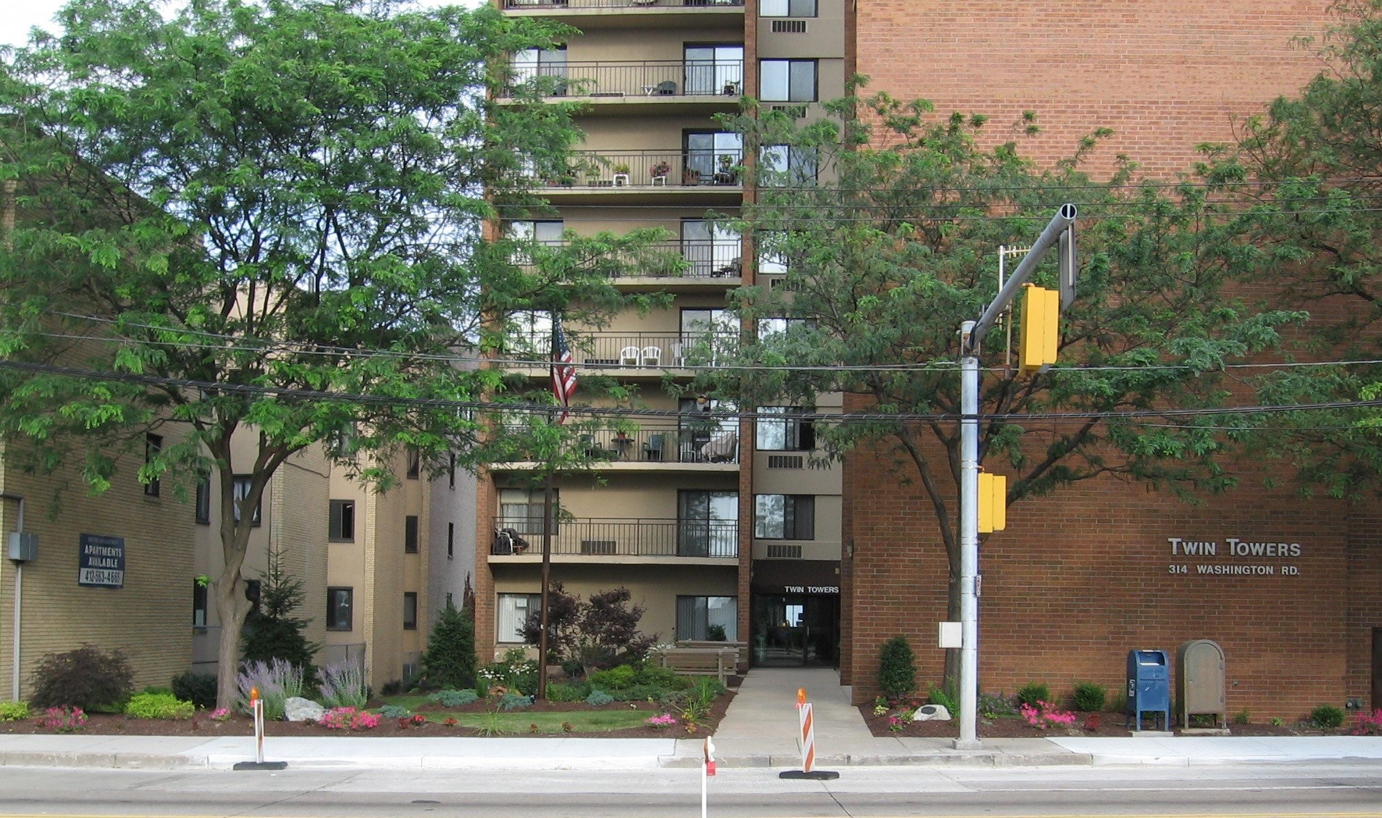 a front view of a building with street view
