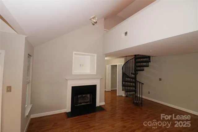 a view of a livingroom with a fireplace